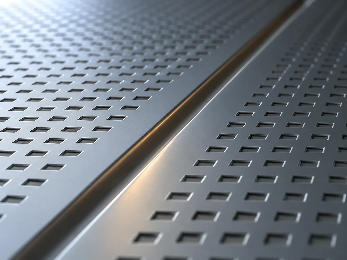 Conceptual image, seen at an angle, of a flat pale grey surface crossed by a single smooth narrow groove, with small square recesses laid out in a regular grid on both sides